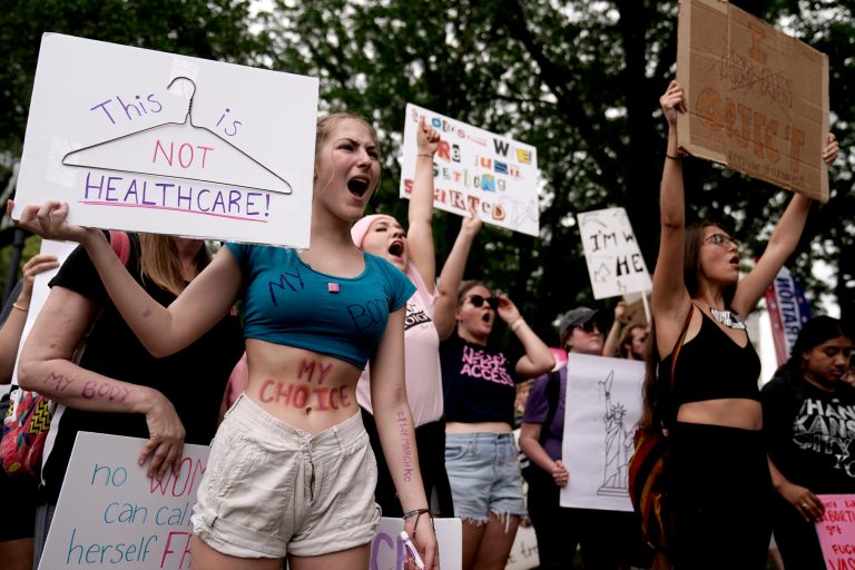 People rally in support of abortion rights, July 2, 2022, in Kansas City, Missouri.