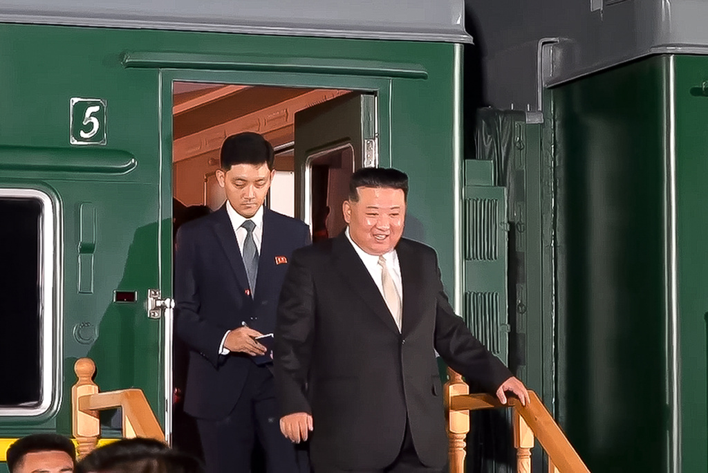 In this Tuesday photo released by the governor of the Russian far eastern region of Primorsky Krai, Oleg Kozhemyako, on his Telegram channel, North Korean leader Kim Jong Un steps down from his train after crossing the border to Russia at Khasan, about 127 km (79 miles) south of Vladivostok.