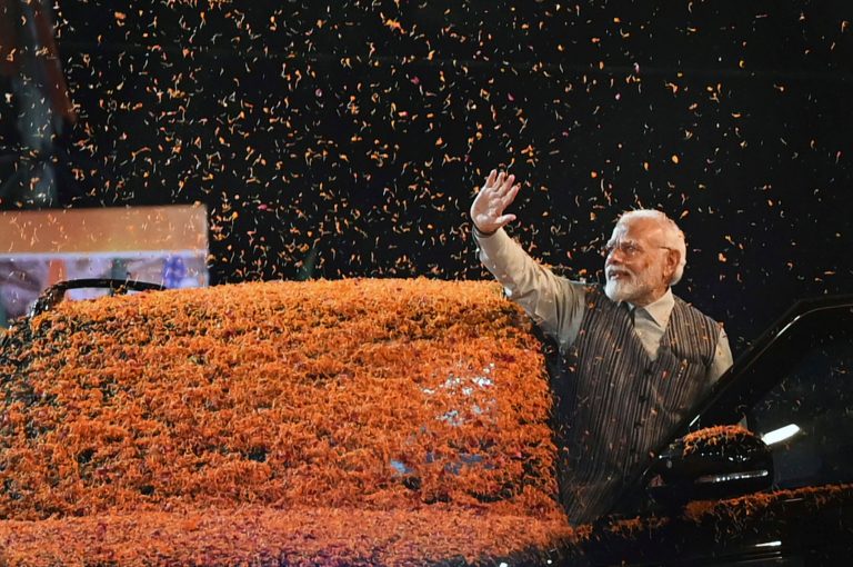 Indian Prime Minister Narendra Modi waves at the crowd as he arrives to attend the Central Election Committee meeting at the headquarters of the Bharatiya Janata Party in New Delhi, India, on Wednesday, Sep. 13, 2023. 
