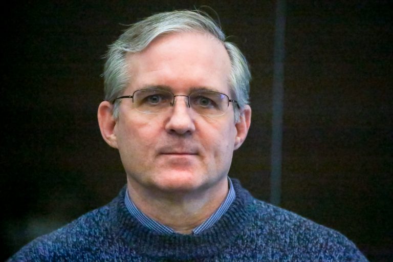 FILE - Paul Whelan, a former U.S. Marine who was arrested for alleged spying, listens to the verdict in a courtroom at the Moscow City Court in Moscow, Russia, June 15, 2020.