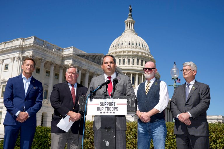 From left, Rep. Rich McCormick, Rep. Ken Calvert, Rep. Mike Garcia, Rep. Derrick Van Orden, and Rep. Brandon Williams speak to reporters about the urgency of passing a defense funding bill.
