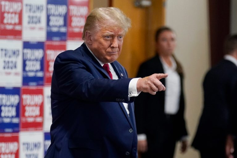Former President Donald Trump arrives for a commit to caucus rally Wednesday, Sept. 20, 2023, in Maquoketa, Iowa.