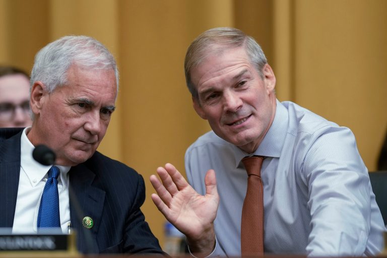 Rep. Tom McClintock, R-Calif., left, confers with House Judiciary Committee Chairman Jim Jordan, R-Ohio, during oversight hearing of Attorney General Merrick Garland on Wednesday, Sept. 20, 2023. (AP Photo/J. Scott Applewhite)