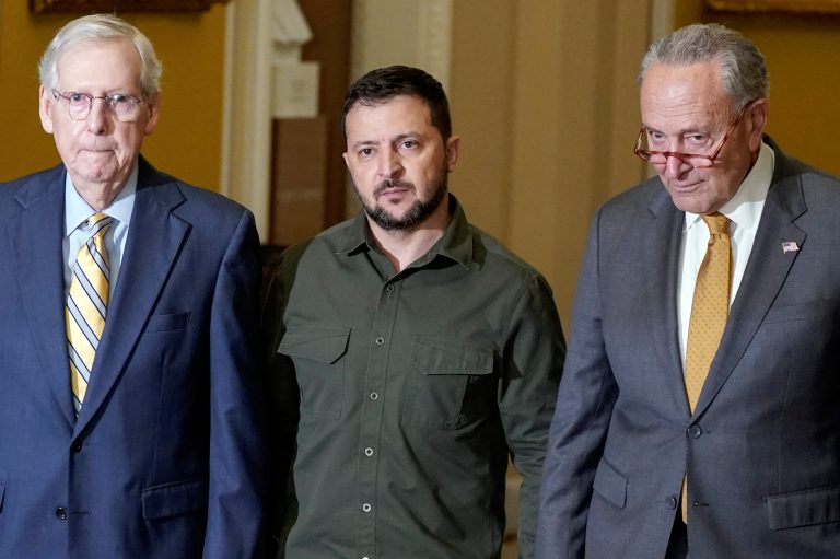 Ukrainian President Volodymyr Zelensky, center, walks with Senate Minority Leader Mitch McConnell and Senate Majority Leader Chuck Schumer on Capitol Hill.