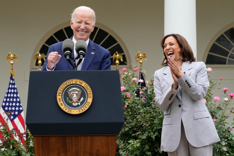 President Joe Biden and Vice President Kamala Harris react to a comment from someone in the audience during an event on Friday, Sept. 22, 2023, in the Rose Garden of the White House in Washington.