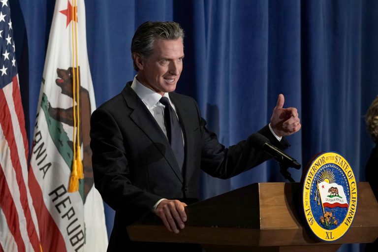 Gov. Gavin Newsom (D-CA) unveils his 2022-2023 state budget revision during a news conference in Sacramento, California, Friday, May 13, 2022.