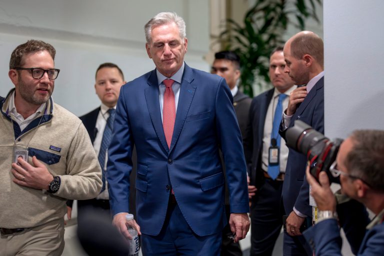 House Speaker Kevin McCarthy (R-CA) emerges from a closed-door Republican strategy session to talk to reporters about updates on funding the government and averting a shutdown at the Capitol in Washington, Wednesday, Sept. 27, 2023.