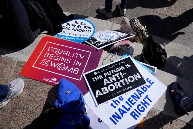 FILE - Demonstrators turn out for 