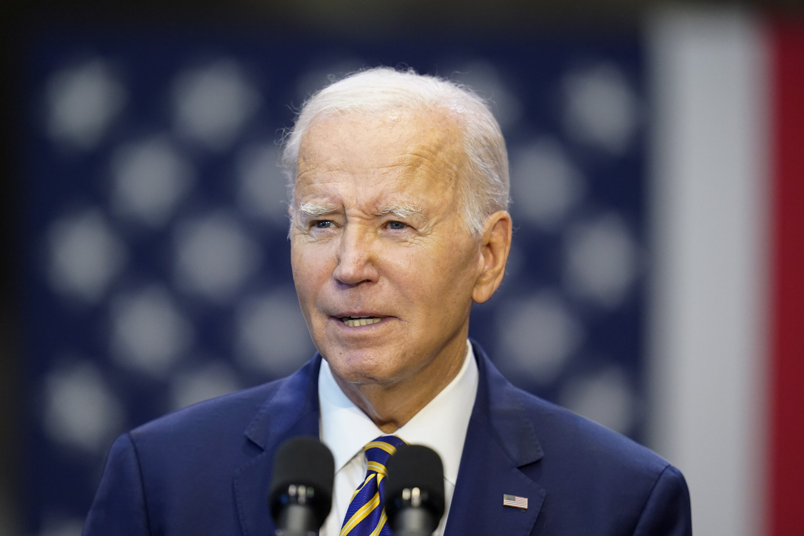 Biden names Trump in protester-interrupted speech on democracy