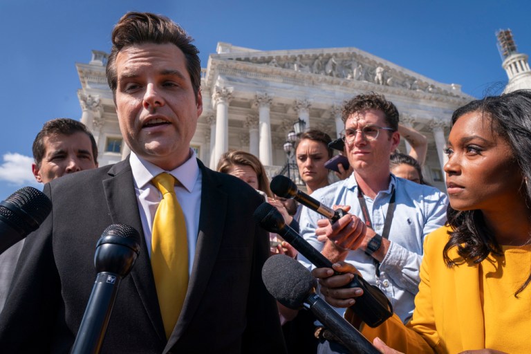 Rep. Matt Gaetz, R-Fla., left, one of House Speaker Kevin McCarthy's harshest critics, answers questions from members of the media after speaking on the House floor, at the Capitol in Washington, Monday, Oct. 2, 2023. Gaetz has said he plans to use a procedural tool called a motion to vacate to try and strip McCarthy of his office as soon as this week. 