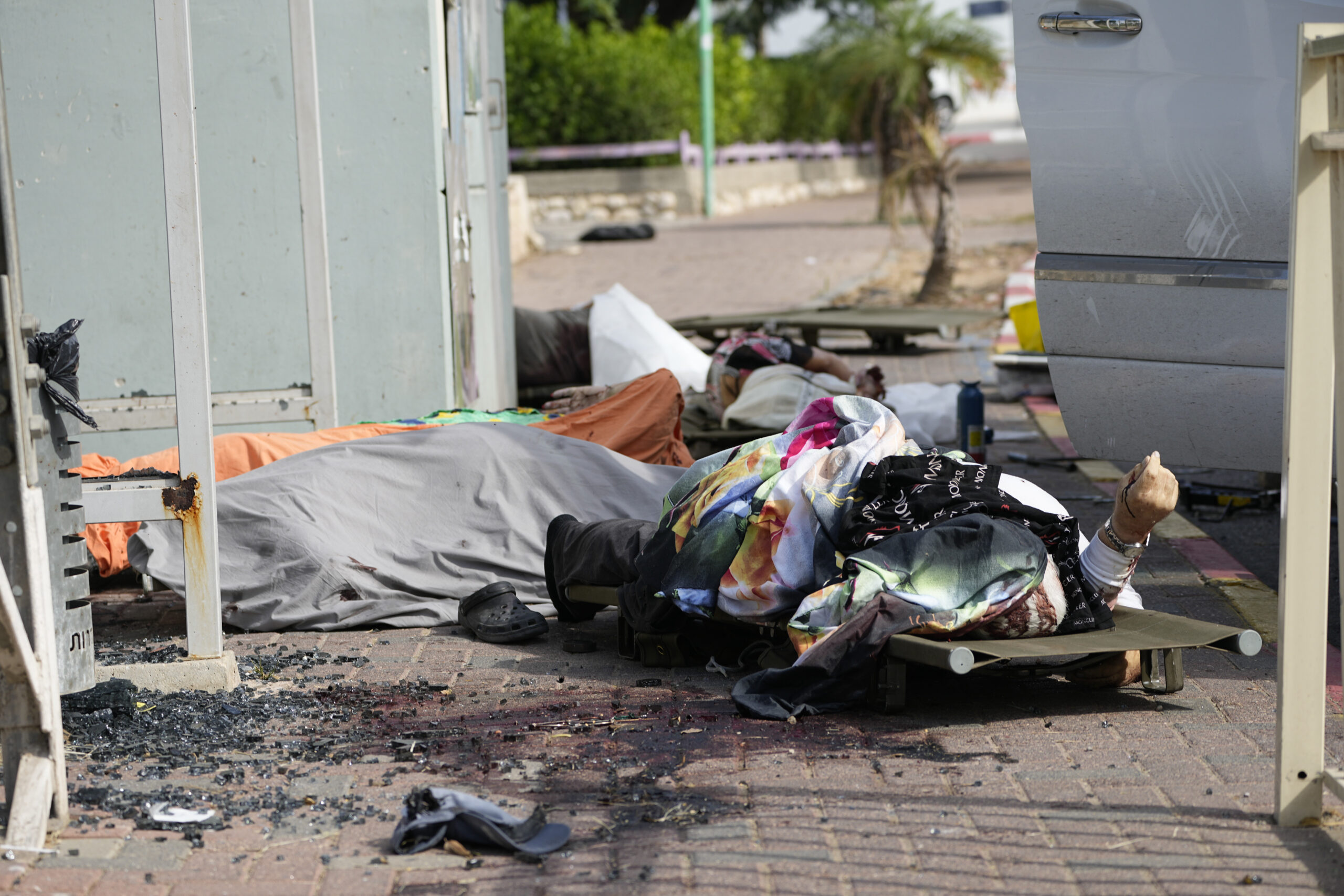 Israeli military confirms Hamas holding soldiers and civilians hostage following surprise attack