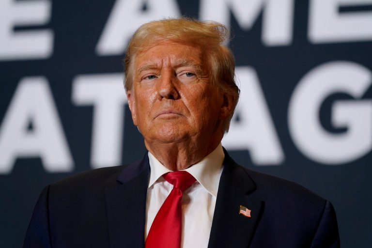 Former President Donald Trump arrives at a commit to caucus rally Saturday, Oct. 7, 2023, in Cedar Rapids, Iowa.