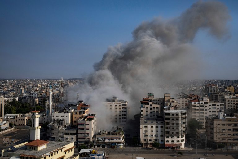 Smoke rises following an Israeli airstrike in Gaza City on Sunday, Oct. 8, 2023. The militant Hamas rulers of the Gaza Strip carried out an unprecedented, multifront attack on Israel at daybreak Saturday, firing thousands of rockets as dozens of Hamas fighters infiltrated the heavily fortified border in several locations, killing hundreds and taking captives.