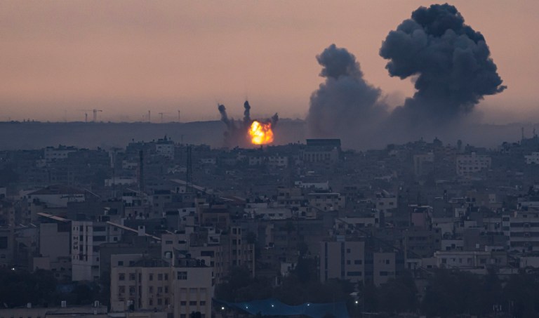 Smoke rises after the Israeli air strike in the Gaza Strip on Monday, Oct. 9, 2023. Israel's military battled to drive Hamas fighters out of southern towns and seal its borders Monday as it pounded the Gaza Strip.