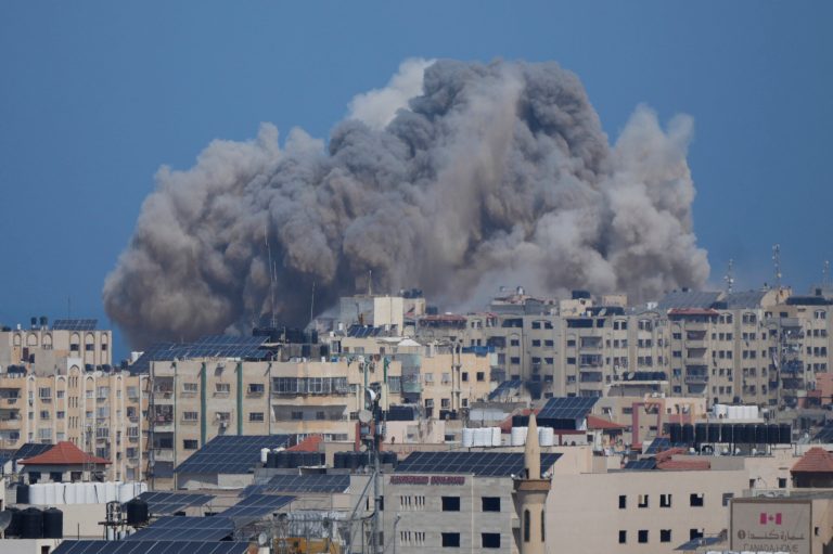 Smoke rises following an Israeli airstrike in Gaza City, Thursday, Oct. 12, 2023. An Israeli ground offensive in Gaza would further escalate the war raging since Hamas launched its unprecedented attack days ago. The United States already deployed one aircraft carrier group to the region, with another on the way. That reflects concerns of a widening conflict and is meant to deter Iran and others.