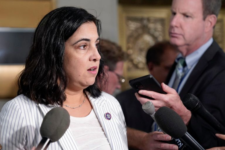 Rep. Nicole Malliotakis, R-N.Y., talks with reporters as Republicans hold a caucus meeting at the Capitol in Washington, Friday, Oct. 13, 2023. (AP Photo/Mariam Zuhaib)