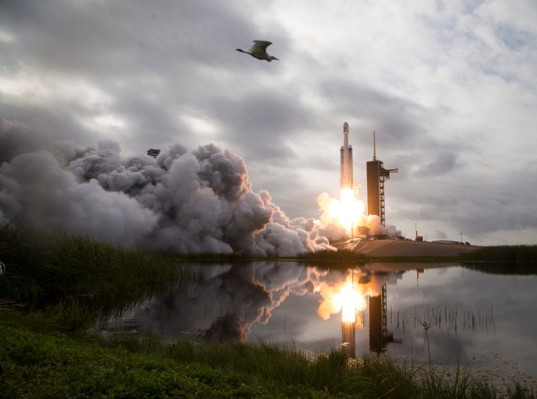 A SpaceX Falcon Heavy rocket with the Psyche spacecraft onboard is launched from Launch Complex 39A, Friday, Oct. 13, 2023, at NASA's Kennedy Space Center in Cape Canaveral, Fla. (Aubrey Gemignani/NASA via AP)