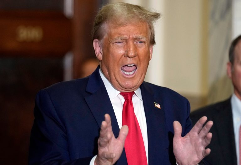 Former President Donald Trump arrives for his civil business fraud trial at New York Supreme Court, Tuesday, Oct. 17, 2023, in New York.