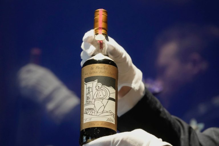A bottle of the world's most valuable whisky is on display during a media preview of Sotheby's auction, Thursday, Oct. 19, 2023, in London. After being aged in sherry casks for six decades, just 40 bottles of The Macallan 1926 were bottled in 1986.