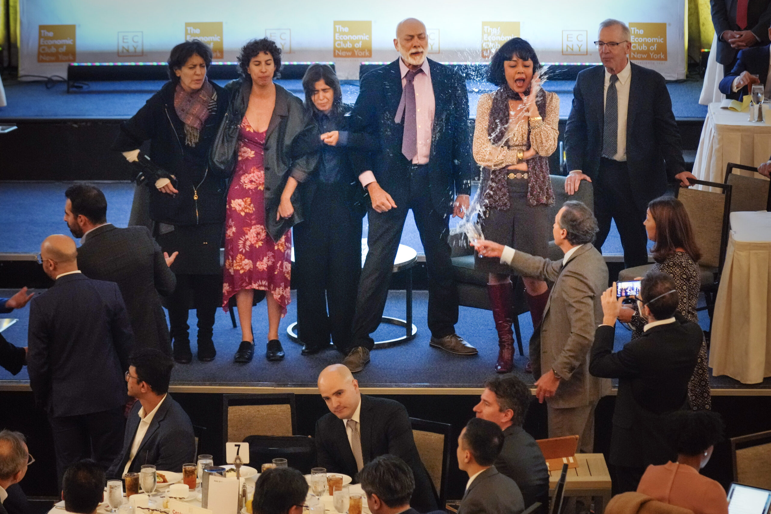 Climate protesters interrupt major speech by Fed Chairman Jerome Powell