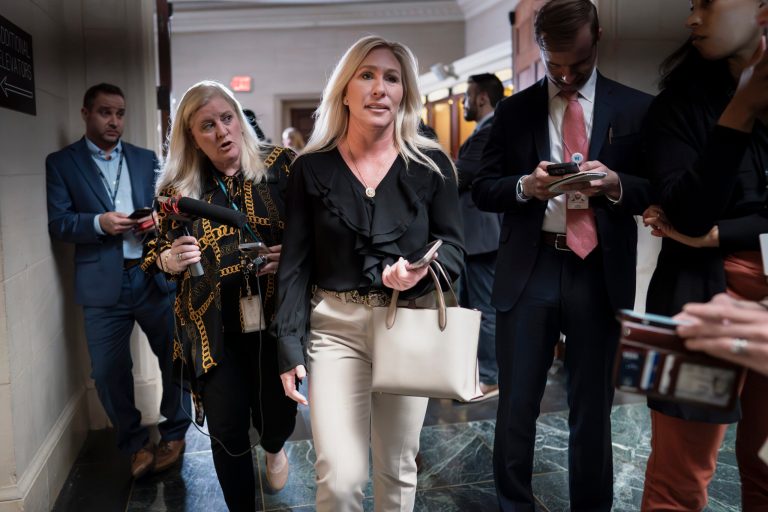 Rep. Marjorie Taylor Greene (R-GA) walks past reporters after Rep. Tom Emmer (R-MN), the GOP whip, dropped out of the race for House speaker, at the Capitol in Washington, Tuesday, Oct. 24, 2023.