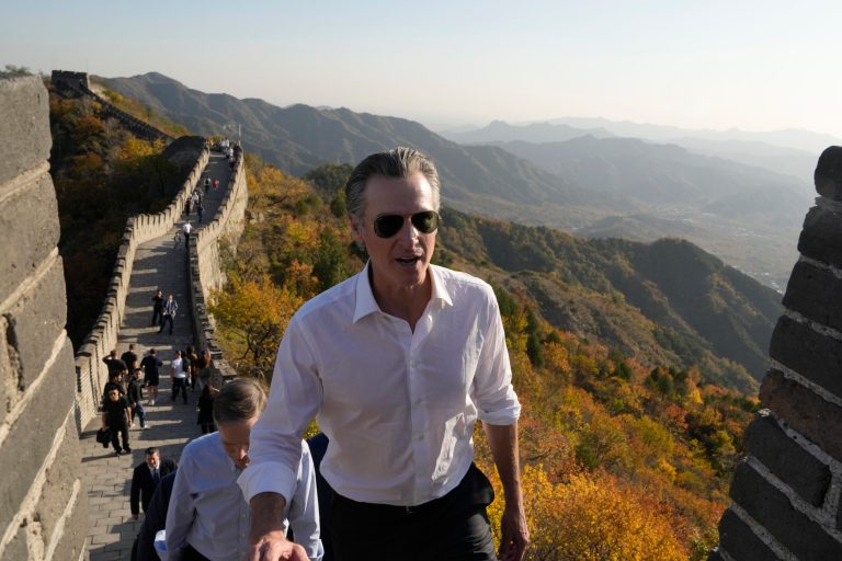 Gov. Gavin Newsom (D-CA) walks up a section of the Mutianyu Great Wall on the outskirts of Beijing, Thursday, Oct. 26, 2023. Newsom is on a weeklong tour of China where he is pushing for climate cooperation. His trip as governor, once considered routine, is drawing attention as it comes after years of heightening tensions between the U.S. and China.