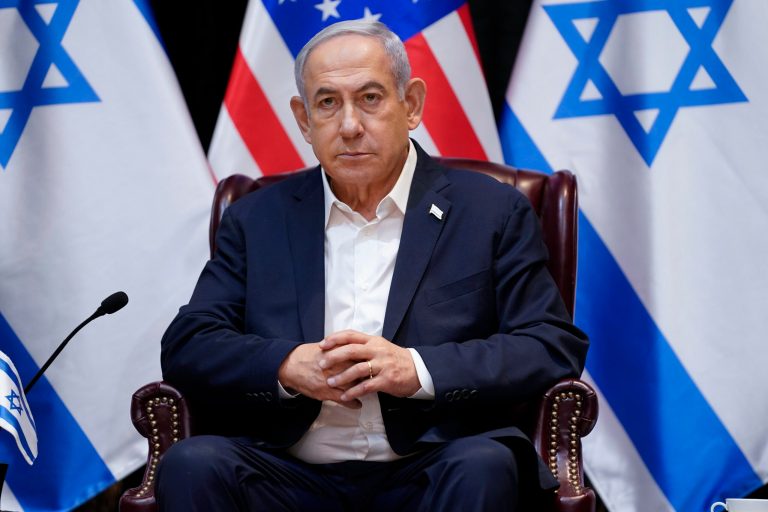 FILE - Israeli Prime Minister Benjamin Netanyahu listens as he and President Joe Biden participate in an expanded bilateral meeting with Israeli and U.S. government officials on Oct. 18, 2023, in Tel Aviv. (AP Photo/Evan Vucci, File)