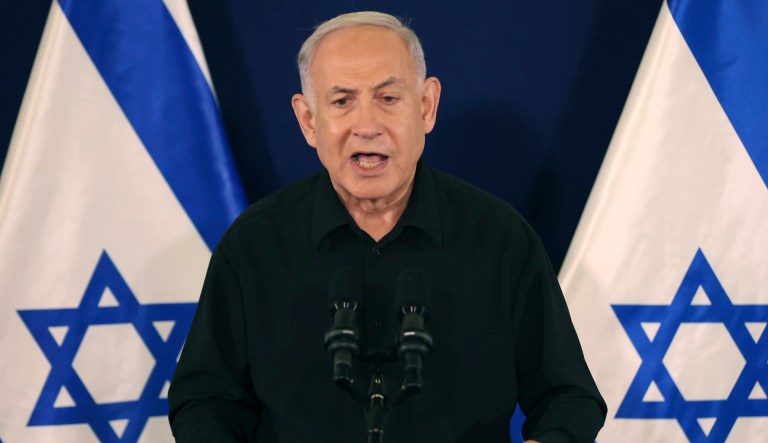 Israeli Prime Minister Benjamin Netanyahu speaks during a press conference with Defense Minister Yoav Gallant and Cabinet Minister Benny Gantz in the Kirya military base in Tel Aviv, Israel, Saturday, Oct. 28, 2023.