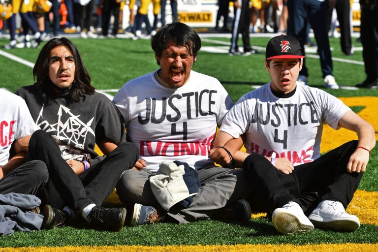 USC Cal game delayed due to protesters demonstrating on field