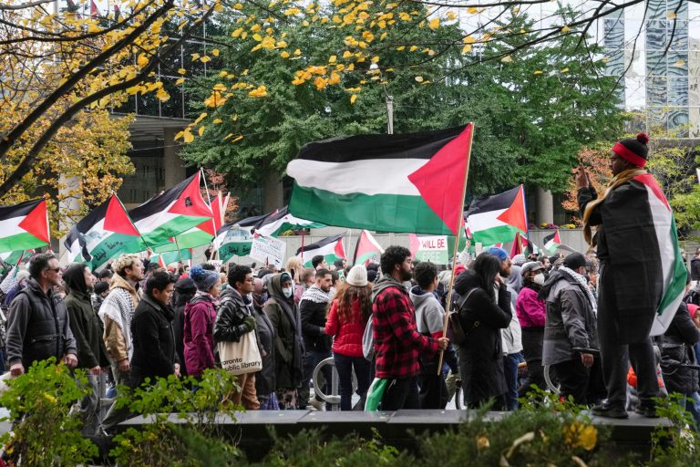 A pro-Palestinian march makes its way through Toronto on Sunday, Oct. 29, 2023. Protesters took to the streets in support of the people in the Gaza Strip amid a war between Israel and Hamas.