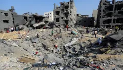 Israel defends airstrike that hit Gaza and killed senior Hamas leader