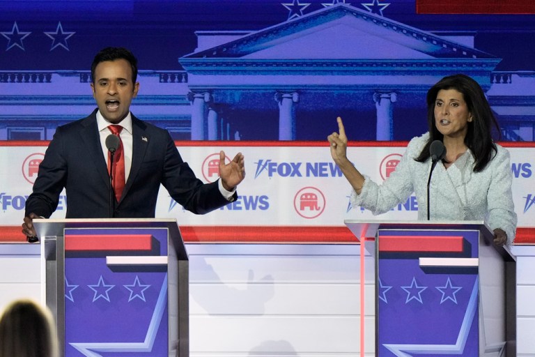 Businessman Vivek Ramaswamy, left, and former U.N. Ambassador Nikki Haley speak during a Republican presidential primary debate hosted by Fox News, Aug. 23, 2023, in Milwaukee.