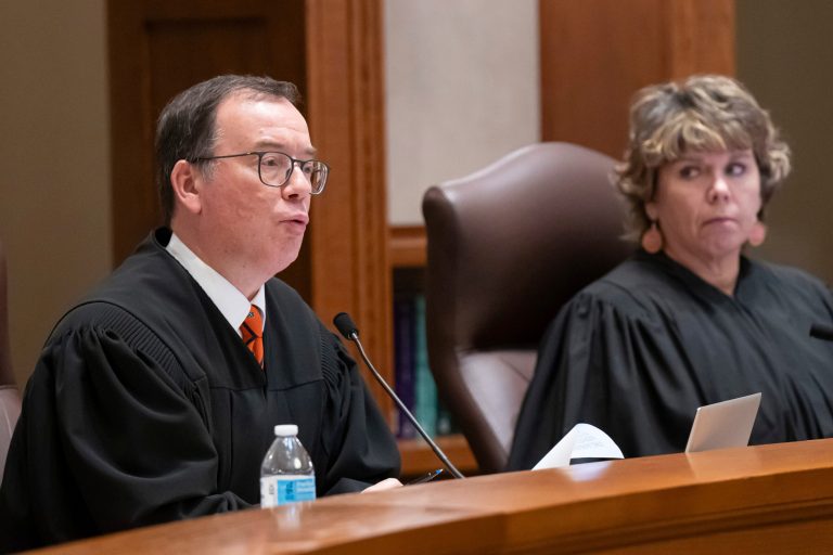 Associate Justice Gordon Moore questions Donald Trump's attorney Nicholas Nelson as he argued his case before the Court Thursday, Nov. 2, 2023.