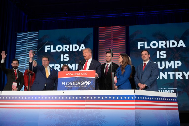Donald Trump taunts Ron DeSantis with latest batch of Florida endorsements Former President Donald Trump, center, is surrounded on stage by supporters at the Republican Party of Florida Freedom Summit, Saturday, Nov. 4, 2023, in Kissimmee, Fla.