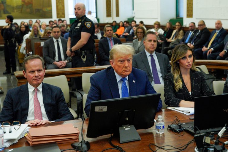 Flanked by his attorneys Chris Kise, left, and Alina Habba, former President Donald Trump waits to take the witness stand at New York Supreme Court, Monday, Nov. 6, 2023, in New York. 