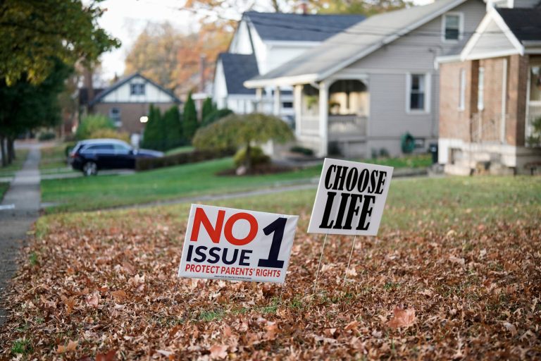 A sign against Issue 1 sits in a residential yard on Election Day, Tuesday, Nov. 7, 2023, in Cincinnati. 