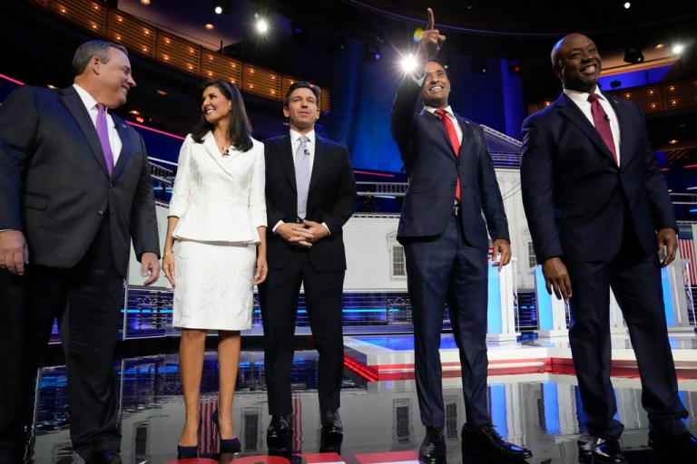 Republican presidential candidates from left, former New Jersey Gov. Chris Christie, former U.N. Ambassador Nikki Haley, Gov. Ron DeSantis (R-FL), businessman Vivek Ramaswamy, and Sen. Tim Scott (R-SC) stand onstage before a Republican presidential debate, Nov. 8, 2023, in Miami.