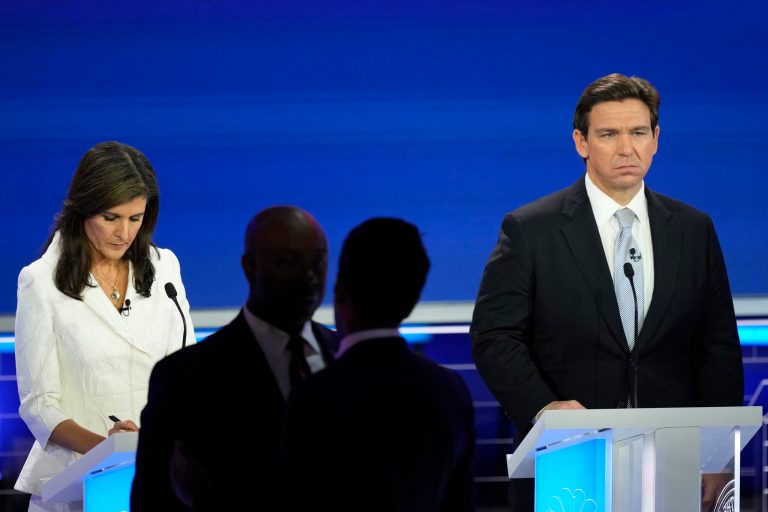 Former U.N. Ambassador Nikki Haley and Gov. Ron DeSantis (R-FL) stand during a break at the Republican presidential primary debate, Wednesday, Nov. 8, 2023.