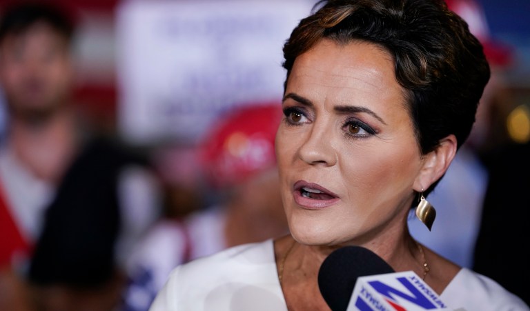 Former Arizona Republican gubernatorial candidate Kari Lake talks in the Spin Room after former President Donald Trump held a campaign rally in Hialeah, Florida, Wednesday, Nov. 8, 2023.