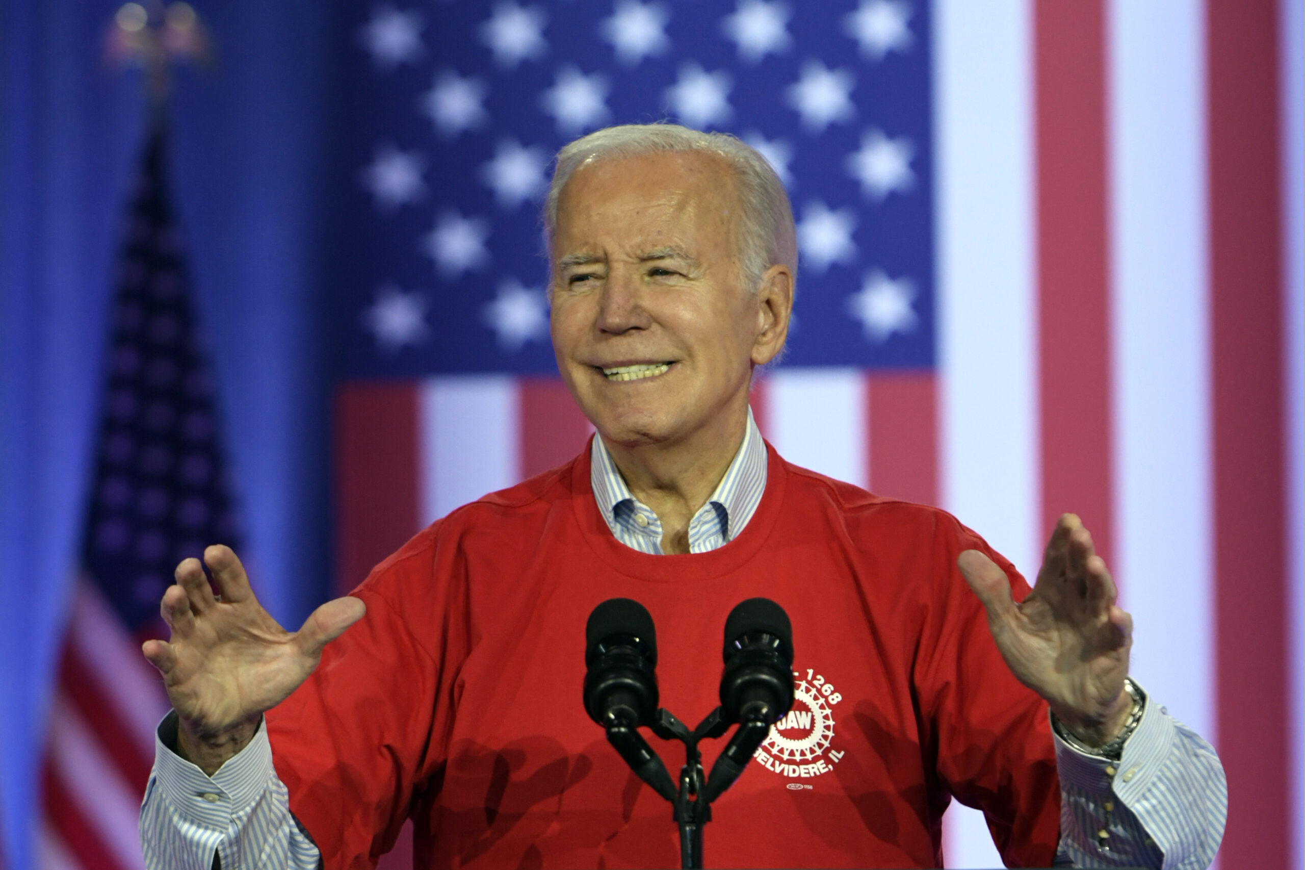 Biden jokes ‘that wasn’t me’ after someone falls during UAW speech