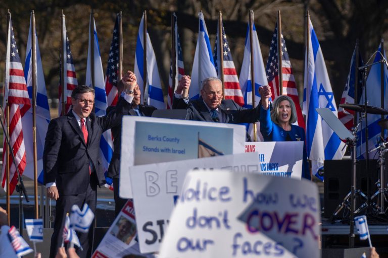 House Speaker Mike Johnson (R-LA), House Minority Leader Hakeem Jeffries (D-NY), Senate Majority Leader Chuck Schumer (D-NY), and Sen. Joni Ernst (R-IA) join a March for Israel rally on the National Mall in Washington, Tuesday, Nov. 14, 2023.