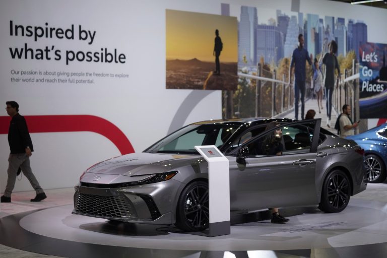 A video crew records the new Toyota Camry 2025 all-electrified model on display at the AutoMobility LA Auto Show, Thursday, Nov. 16, 2023.