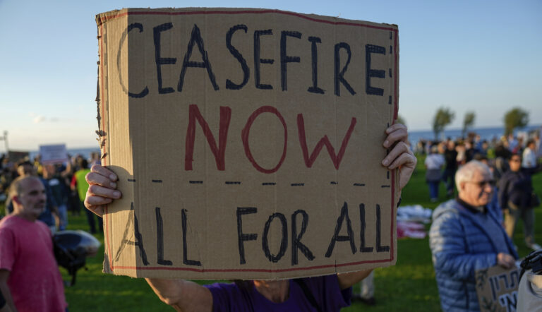 A small crowd gathered to call for a ceasefire in the Israel-Hamas war, in Tel Aviv, Israel, Saturday, Nov. 18.