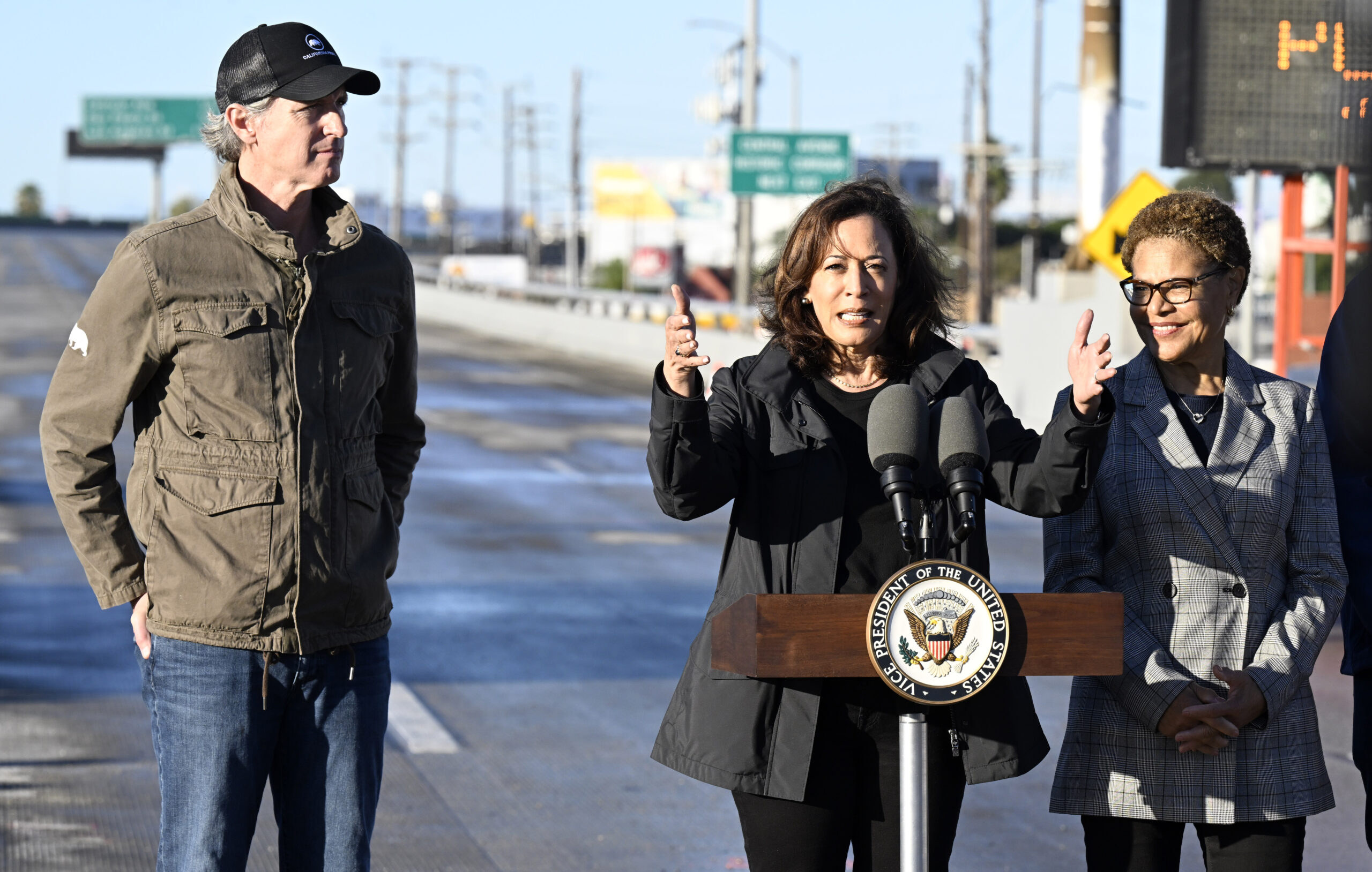 Vice President Kamala Harris, center, speaks with Gov. Gavin Newsom (D-CA), left, and Los Angeles Mayor Karen Bass about I-10, which was closed by an underpass fire on Nov. 11, 2023, in Los Angeles on Nov. 19.