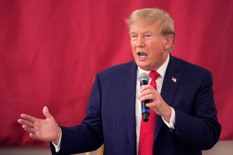 Republican presidential candidate and former President Donald Trump speaks to Texas state troopers and guardsmen at the South Texas International Airport, Sunday, Nov. 19, 2023, in Edinburg, Texas.