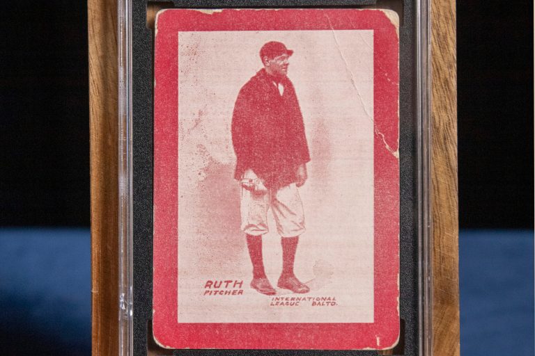 Brian Dwyer of Robert Edward Auctions shows a 1914 Baltimore News baseball card featuring a 19-year-old Babe Ruth in his rookie year that he expects to sell for upwards of $10 million in Chester, New Jersey, on Nov. 20, 2023.