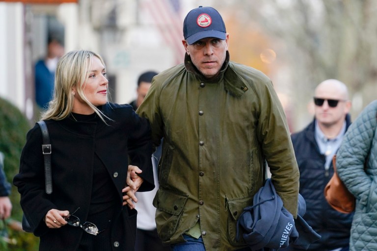 Hunter Biden walks with wife Melissa Cohen as they visit shops with President Joe Biden and first lady Jill Biden in Nantucket, Massachusetts, Nov. 24, 2023. 