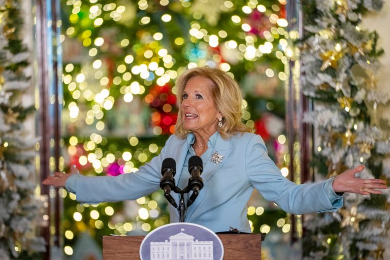 First lady Jill Biden speaks during the unveiling of the White House holiday decorations, in the Grand Foyer of the White House, Monday, Nov. 27, 2023, in Washington. 