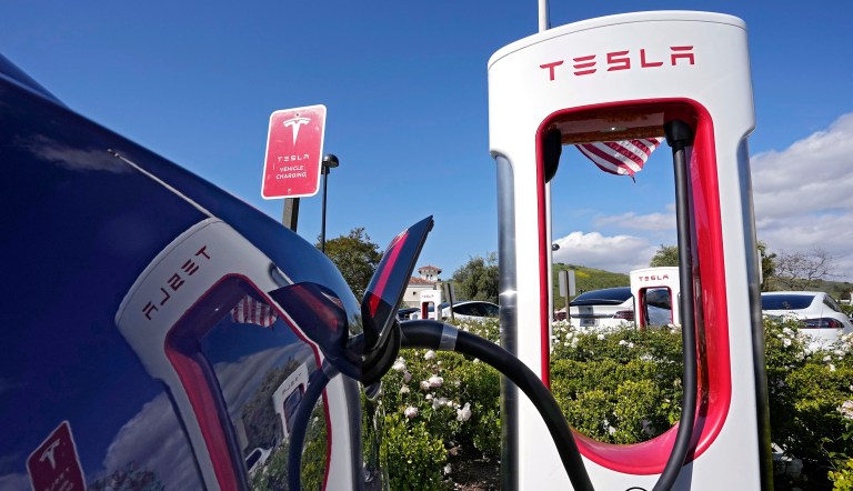 Tesla electric vehicles are seen at Tesla chargers, May 10, 2023, in Westlake, California. 