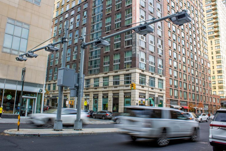 Recently installed toll traffic cameras stand above a Manhattan street, Friday, Nov. 16, 2023, in New York. 